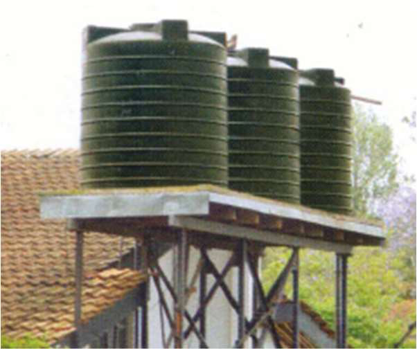 Elevated plastic water storage tanks supported on a metal frame struct