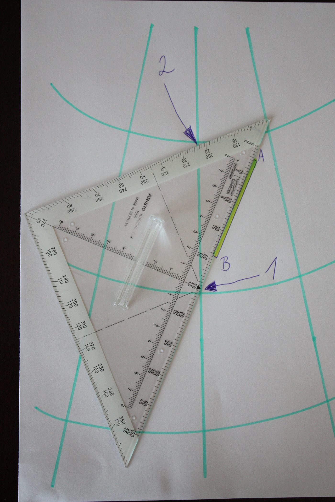 30°/60° set square on paper