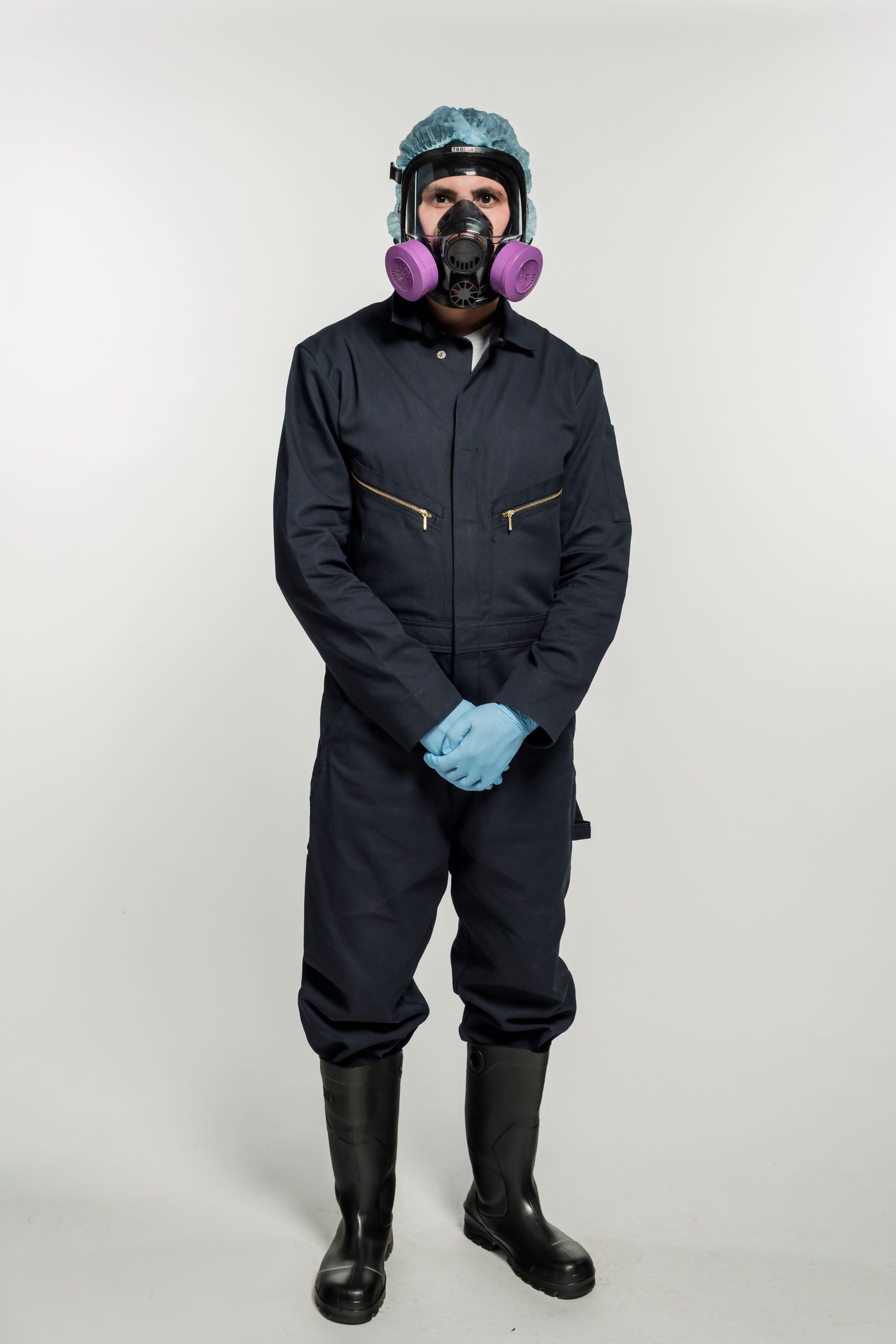 Person wearing a construction face mask with filters