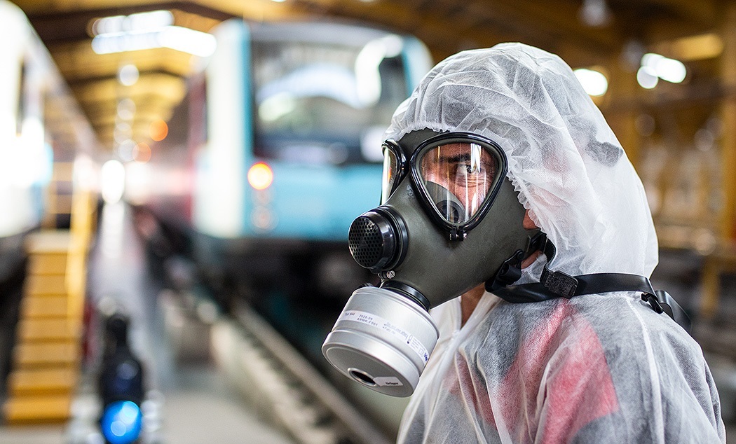 Person wearing a full-face respirator mask