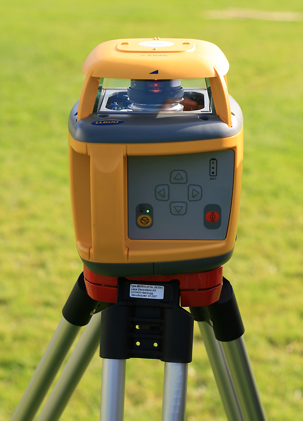Rotary laser level on tripod