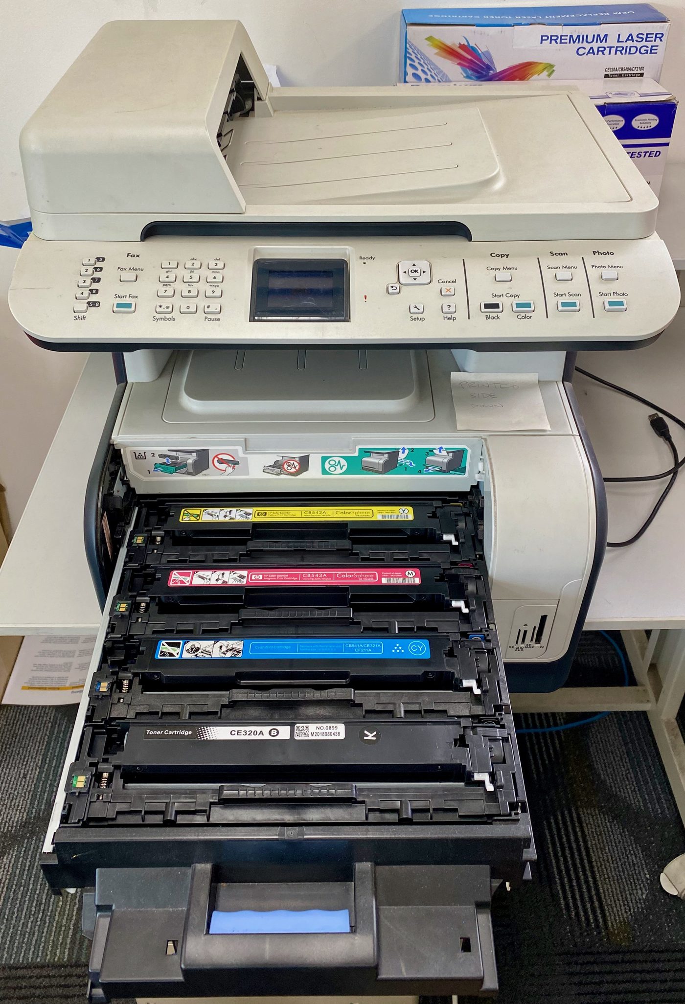 Laser printer with toner cartridges exposed