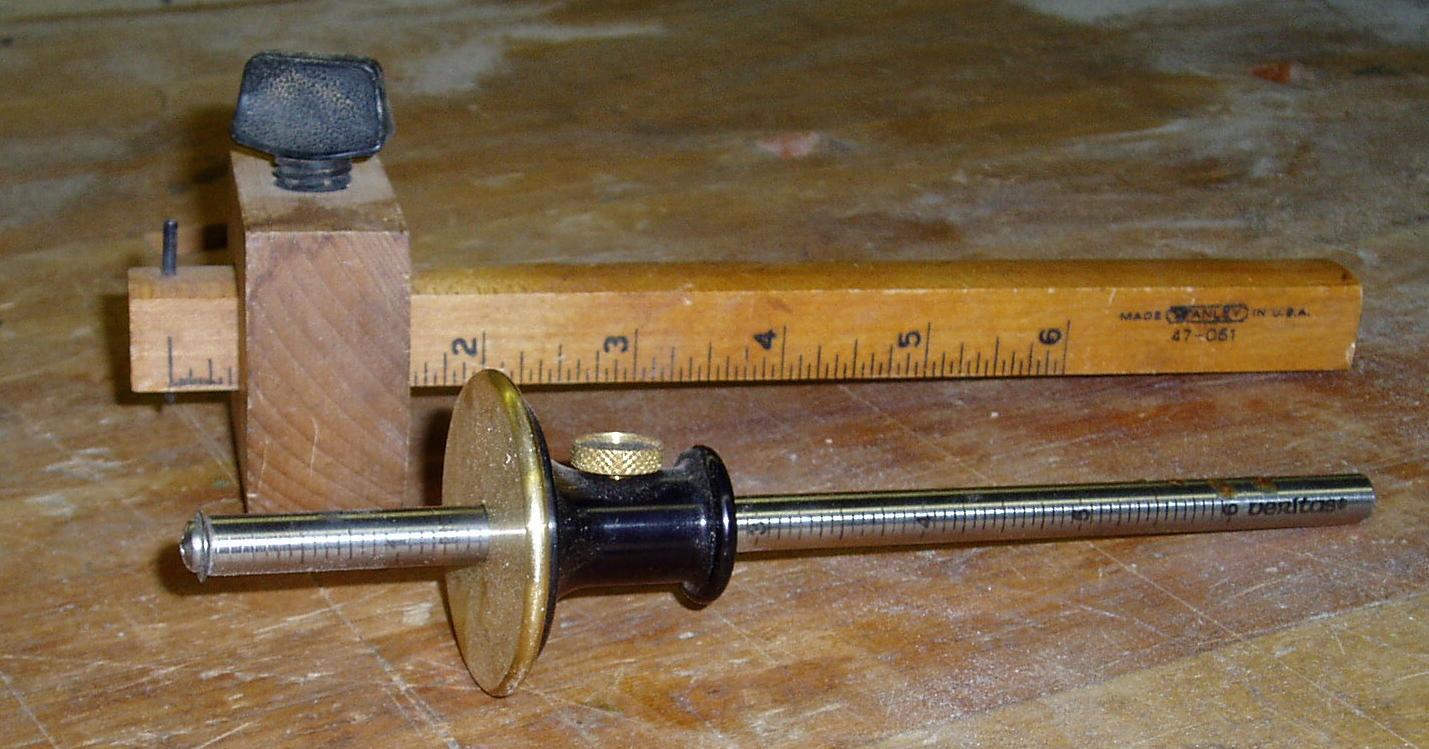 Two marking gauges used in carpentry