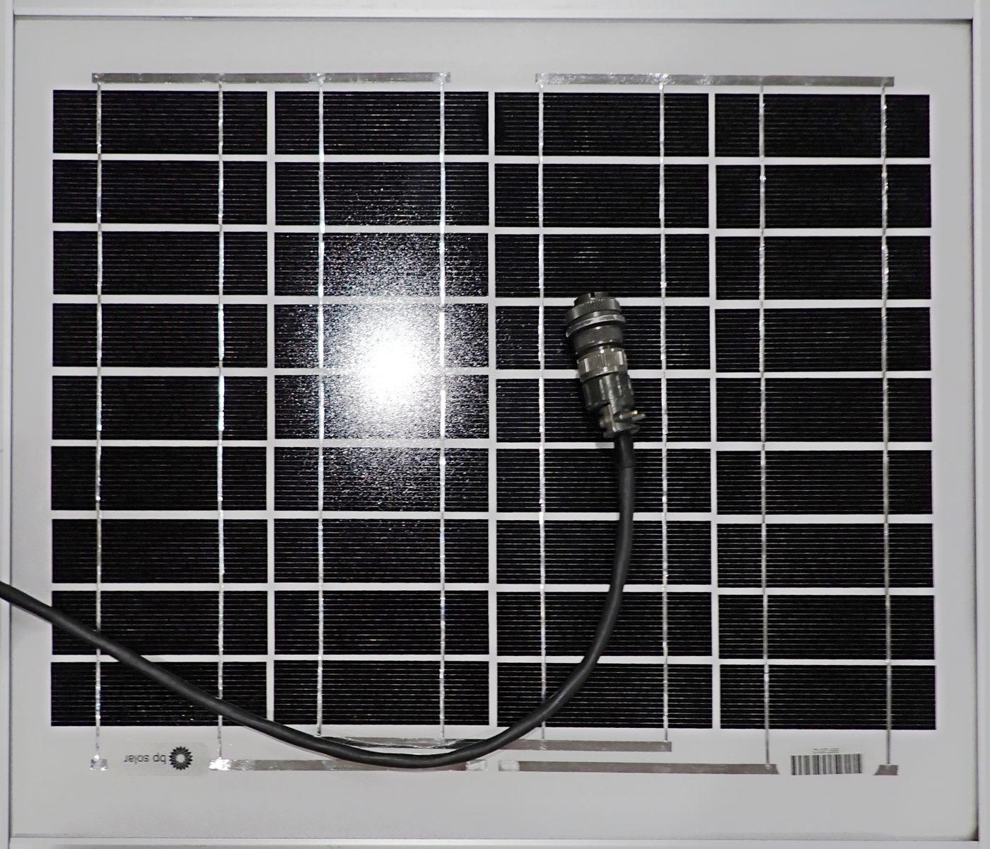 Monocrystalline solar panel with connector cable