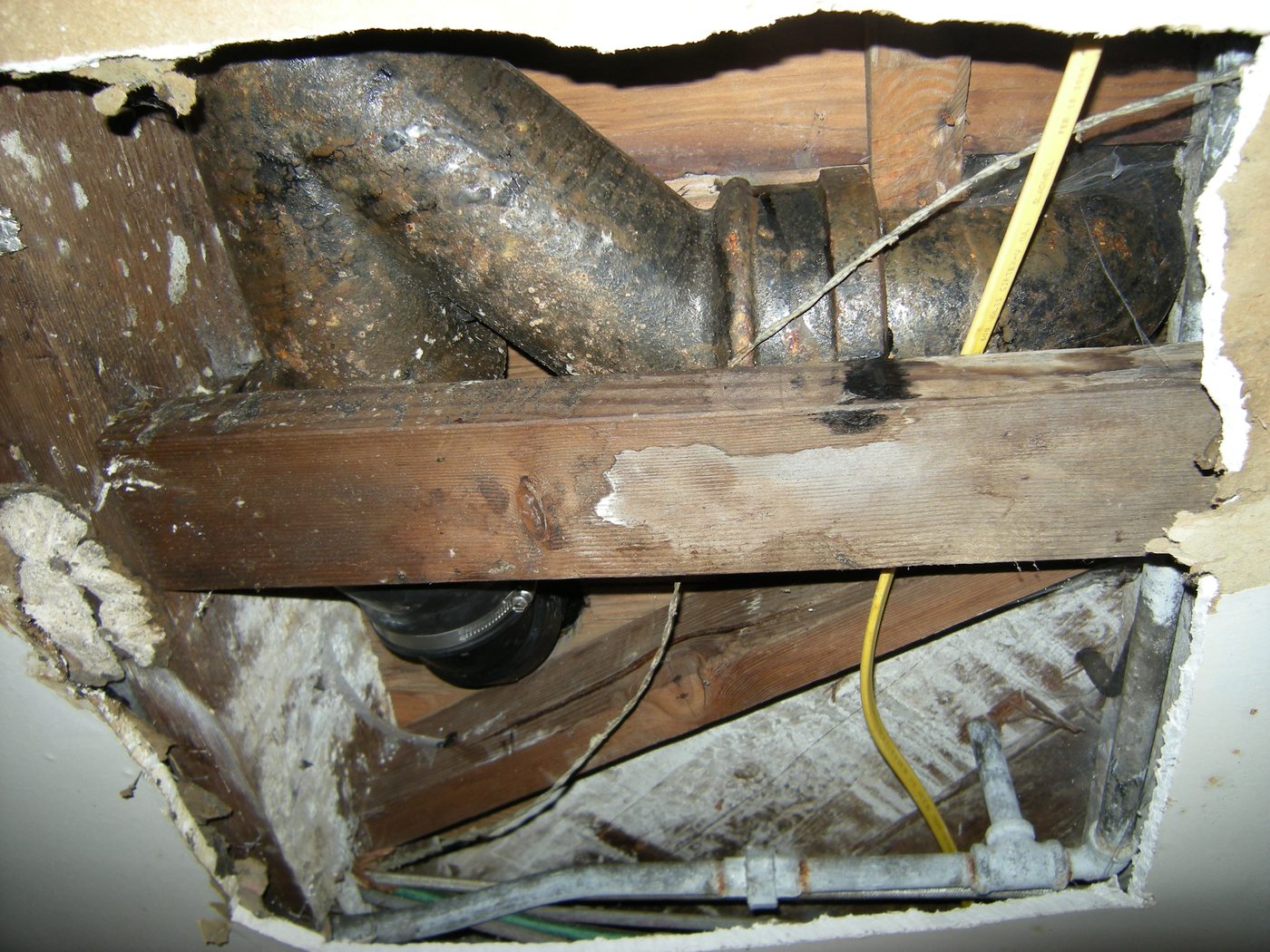Exposed pipes inside a wall cavity