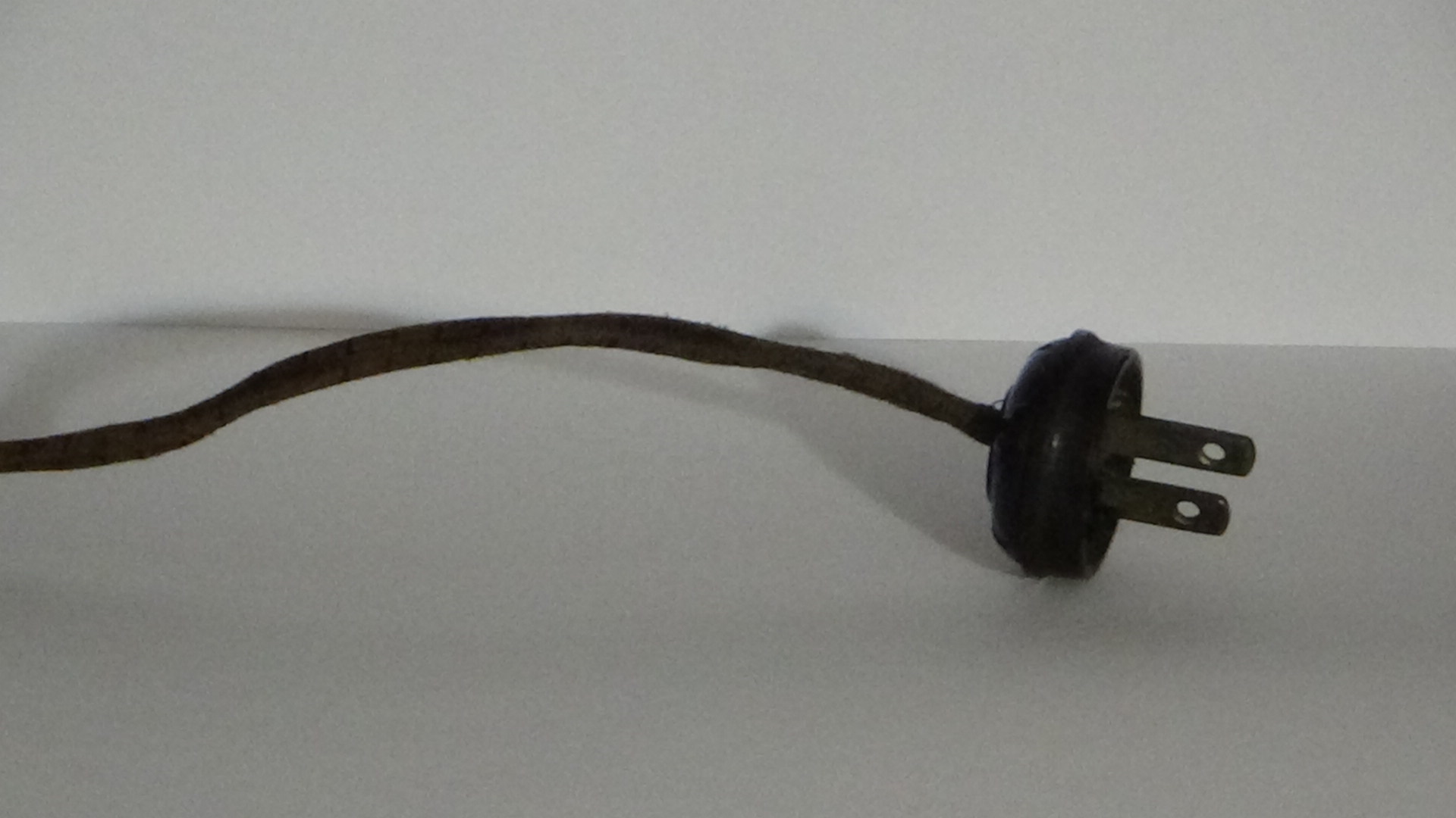Old-style power cord with plug