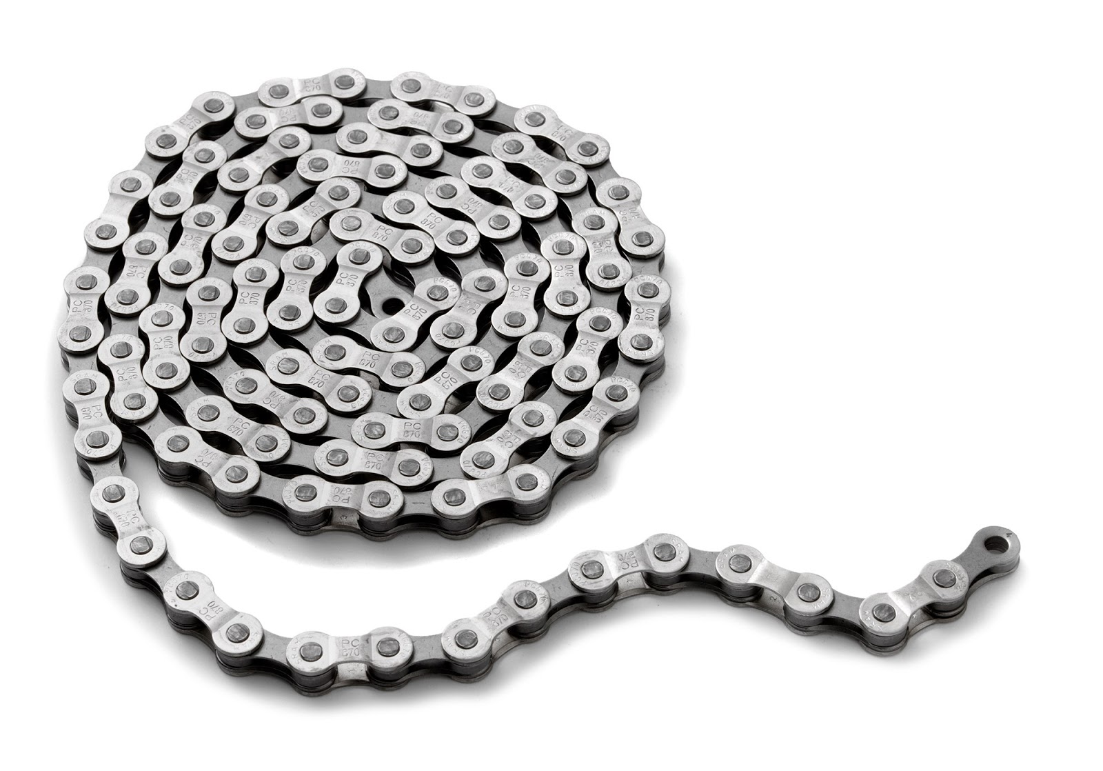 metal roller chain coiled on white background