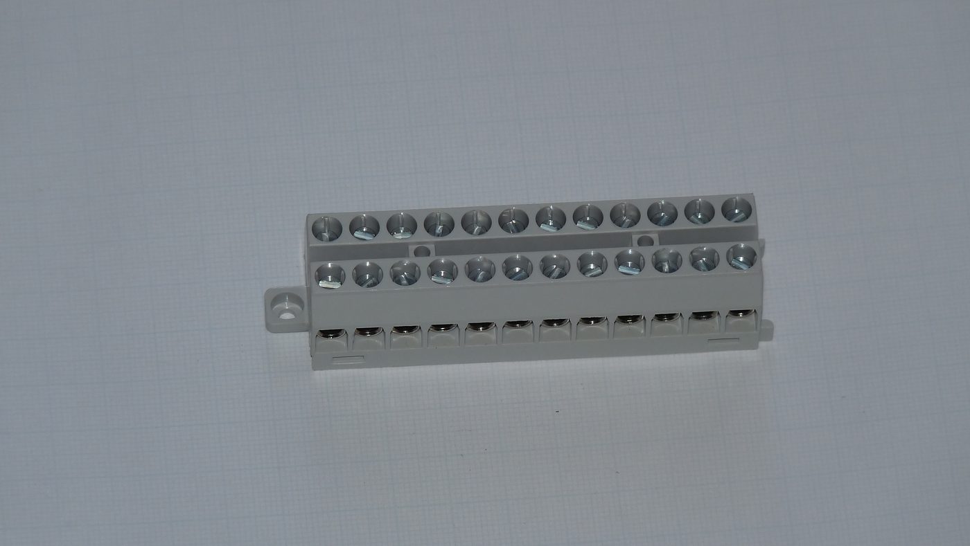two rows of screw terminals on a connector block