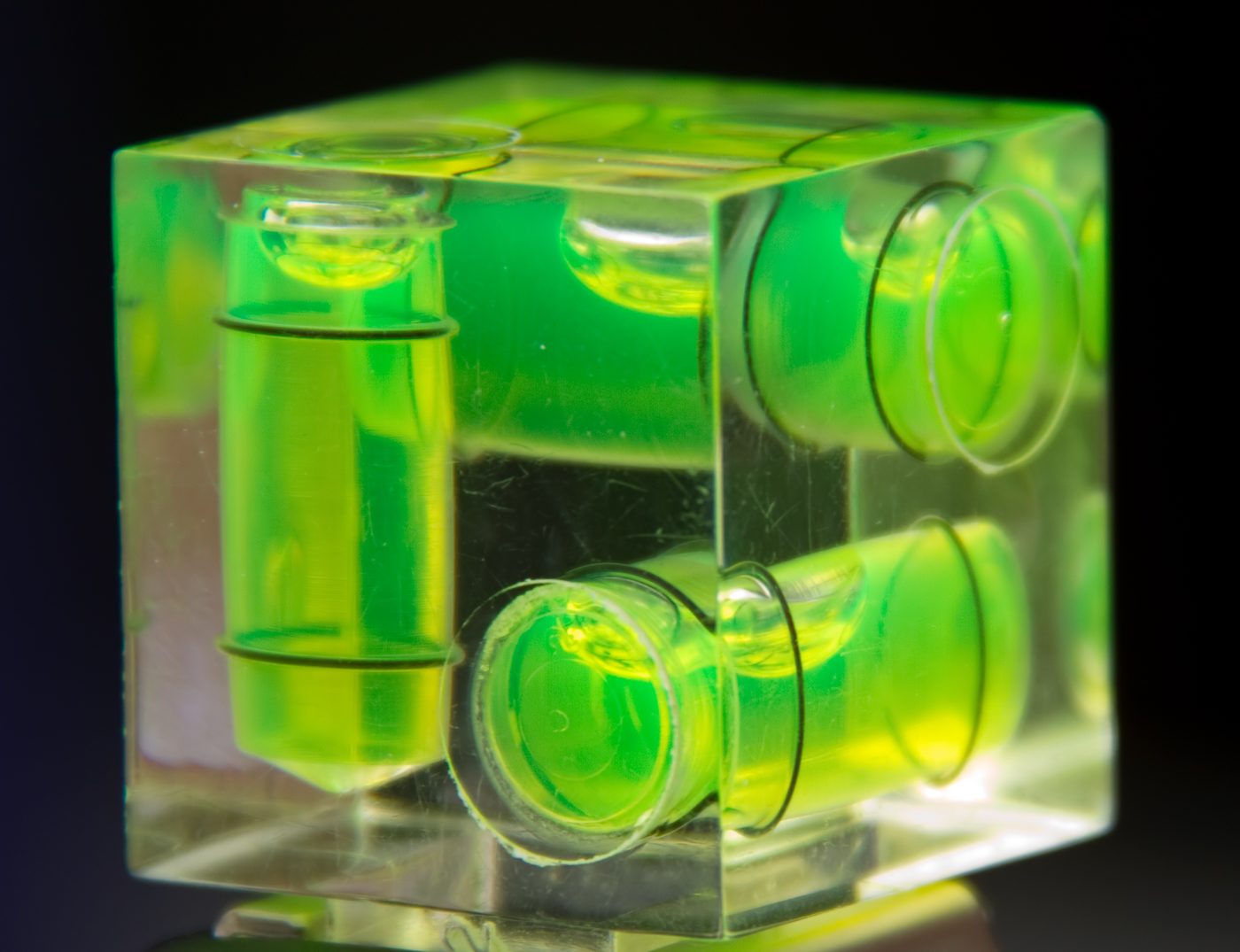 Close-up of a spirit level vial block