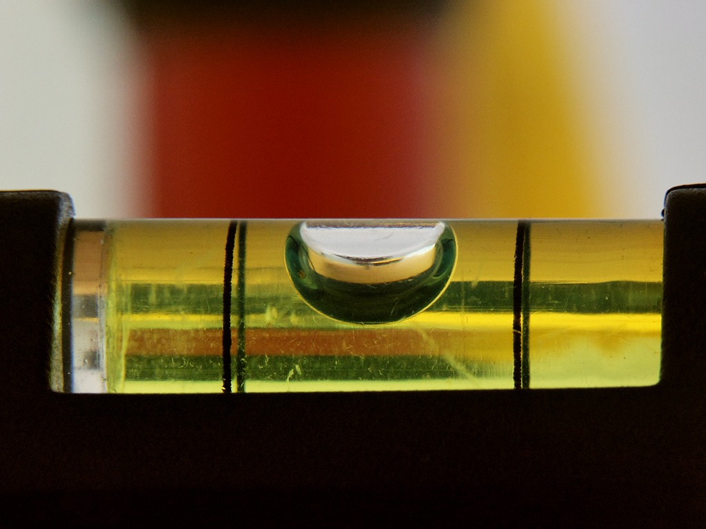 Close-up of a spirit level bubble vial