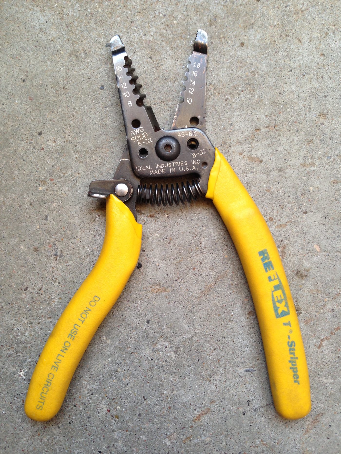 Yellow-handled wire stripper tool
